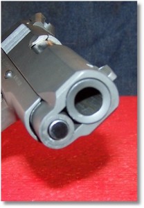 The Working End of the Rock Island Standard Compact - Note Marks on Recoil Guide Bushing From Using the Large and heavy Paper Clip  Used During Disassembly and Assembly