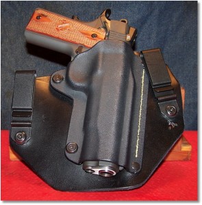 The Springfield 1911 Loaded In the SHTF Gear IWB Holster.  Note the "Peek-a-Boo" at the bottom But Everything is Protected