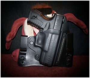 The Springfield XDm 3.8 Compact 45 At Home in a Black Arch Holster