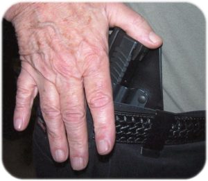 The Final Push - Note Thumb on Top of  Rear of Slide as Fingers Continue to Protect the Firearm 