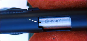 The Expert’s loaded chamber indicator shows a cartridge rim in the slot at the rear of the barrel.
